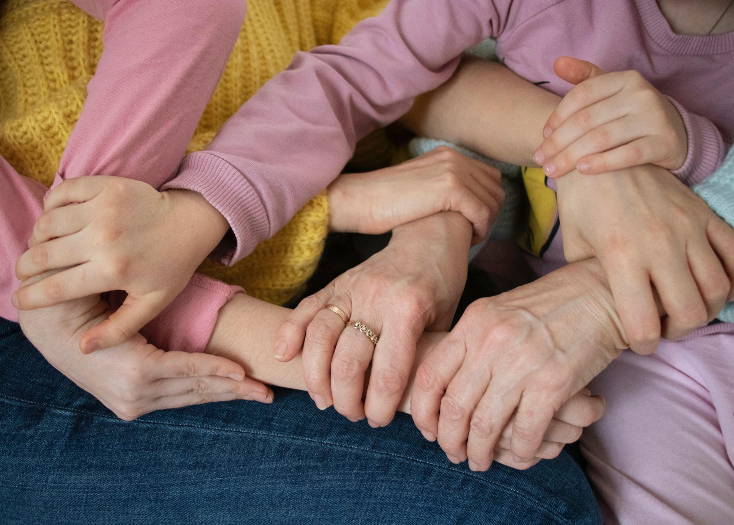 Family holding hands | Image Source: Pexels Family holding hands | Image Source: Pexels